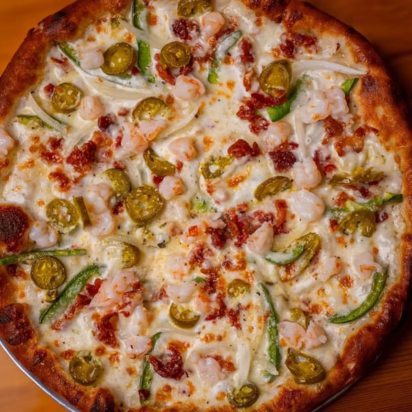 Sal's Famous Pizzeria's white pizza with shrimp, bacon, jalapeños, green peppers, and onions.